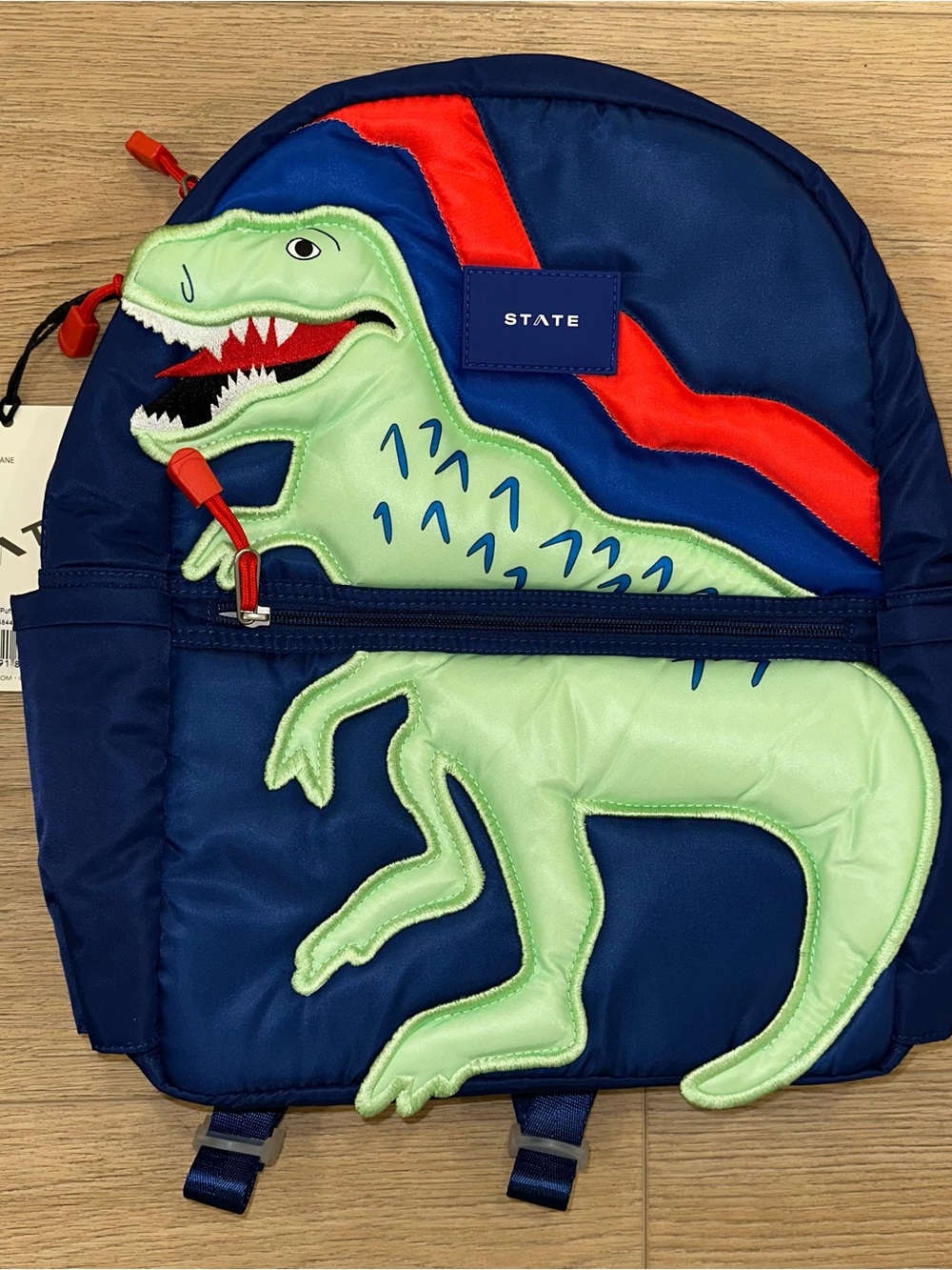 STATE Kids Navy Backpack with Light Green Dinosaur and Red Accent